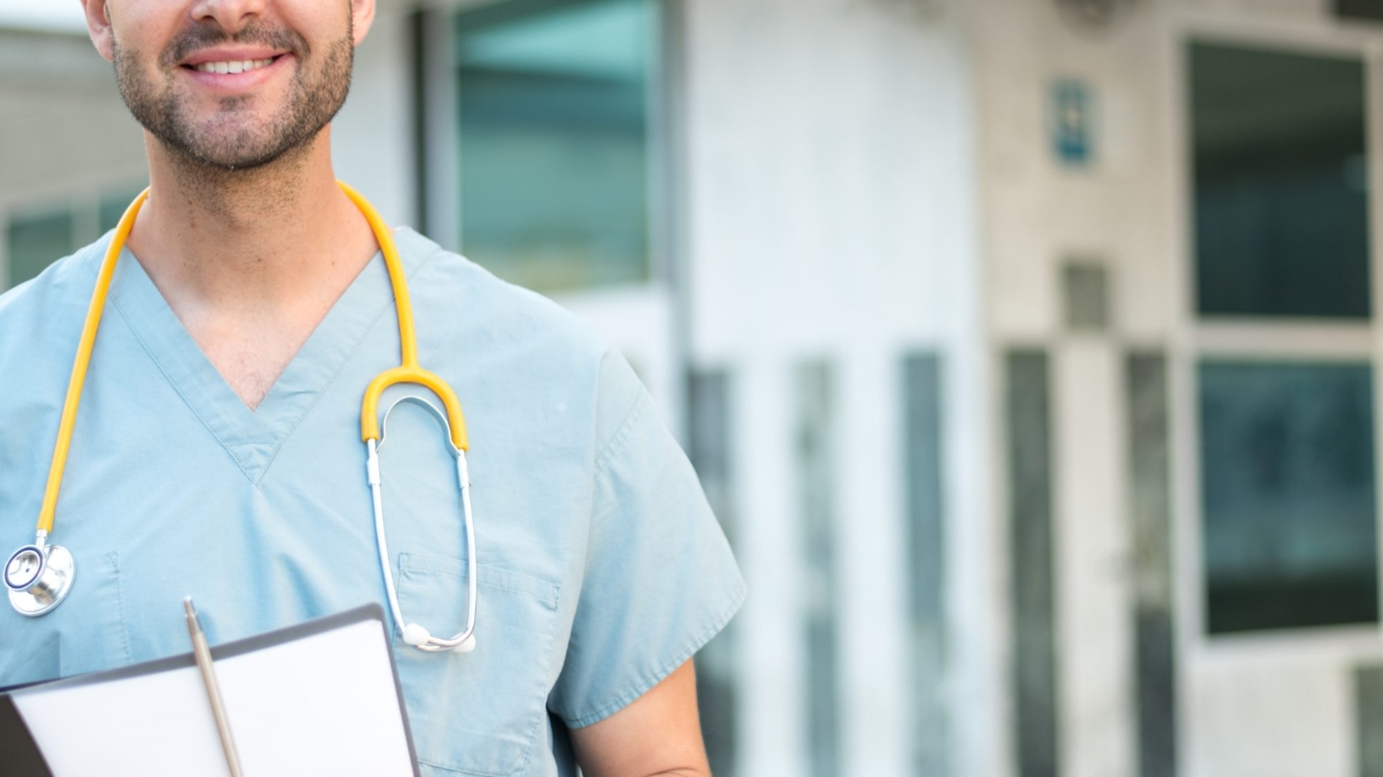 male-nurse-with-stethoscope-MBQ4P3Y